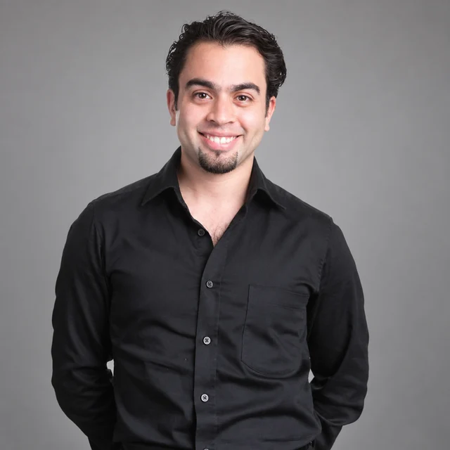 Daniel Guajardo smiling in a black shirt.
